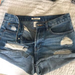 Distressed billabong jean shorts
